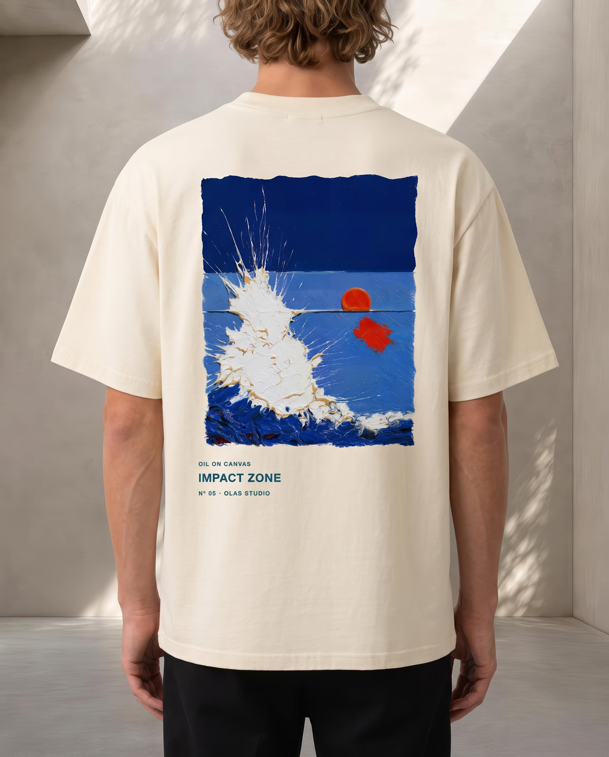 A model seen from the back in the Impact Zone tee, the work printed large across the upper back