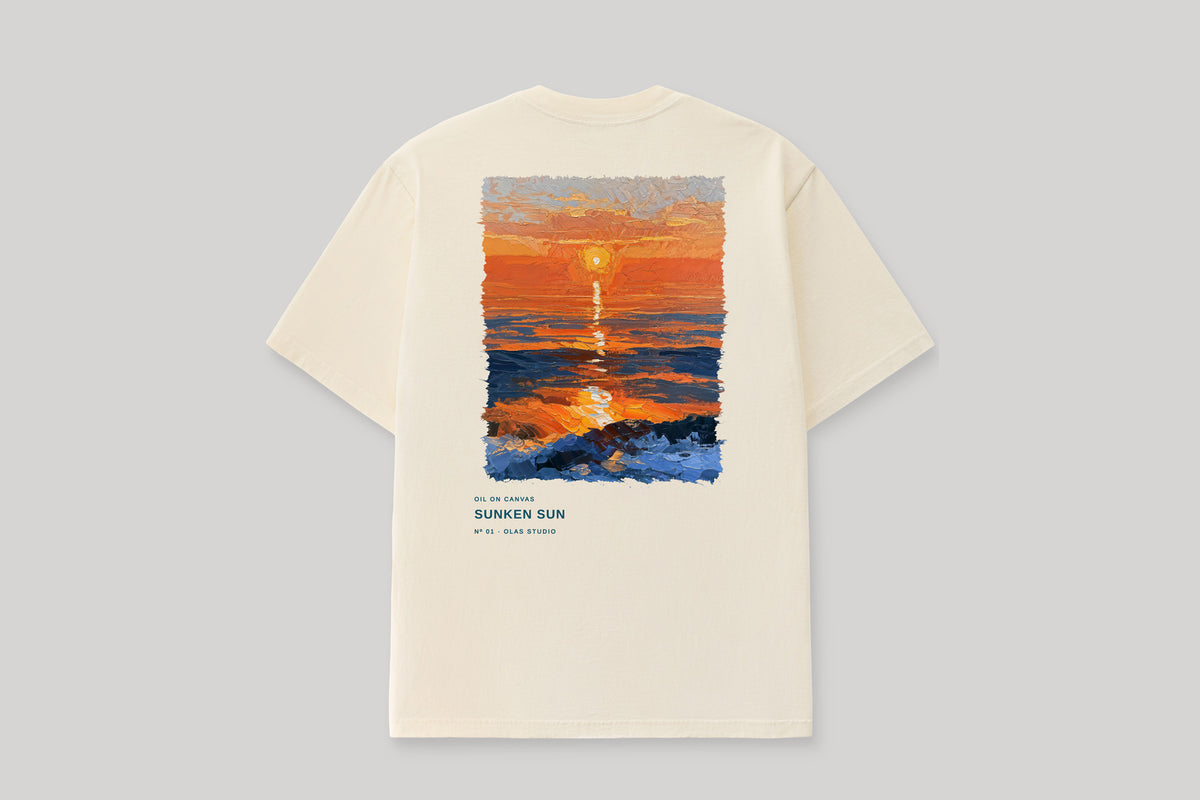 Back of the cream Sunken Sun T-shirt laid on a neutral surface.