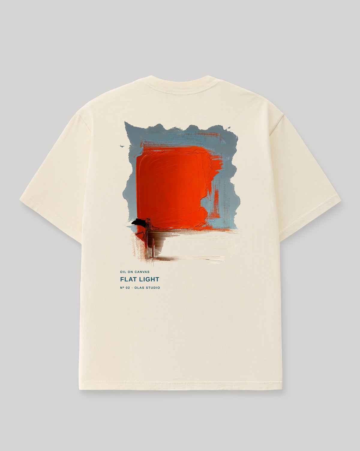 Back of a cream Olas Studio T-shirt with Flat Light: a flat orange block over a pale field, framed by blue-gray strokes and a dark scraped mark.