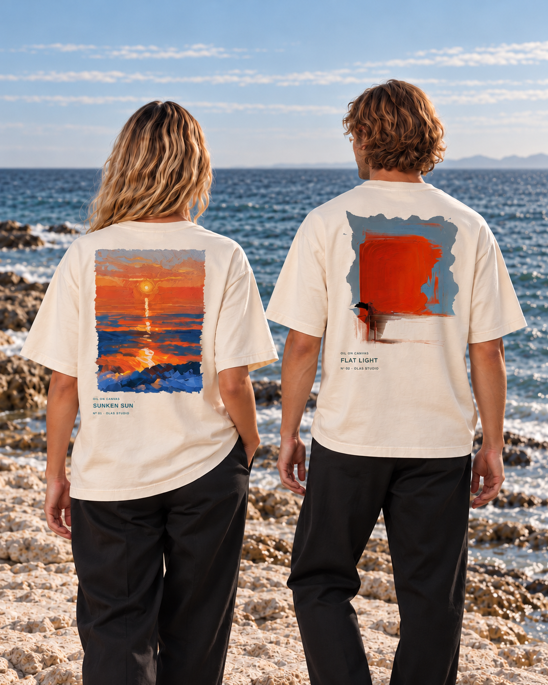 Two models viewed from behind at the coast, wearing Sunken Sun and Flat Light.
